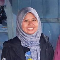 Portrait of satisfied female customer with glowing healthy skin smiling warmly